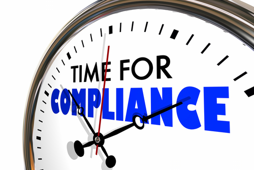 clock with the words Time For Compliance