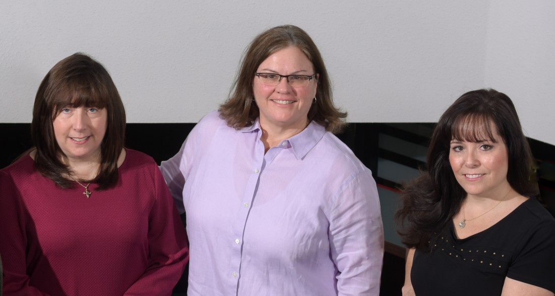 Sherri McDaniel, Dr. Heidi Reyst and Monique Kurkowski sitting on a couch together